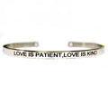 Stainless steel cuff bracelet with engraved "LOVE IS PATIENT, LOVE IS KIND"