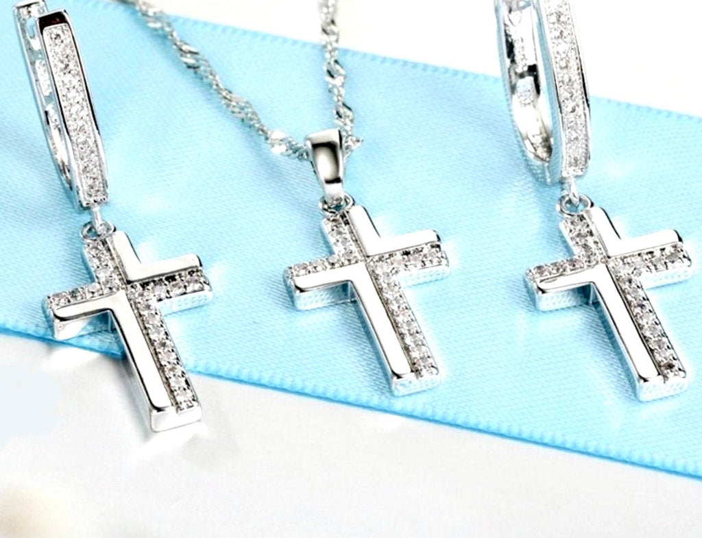 Silver cross earrings with zircon pavé detail on hanging hoops