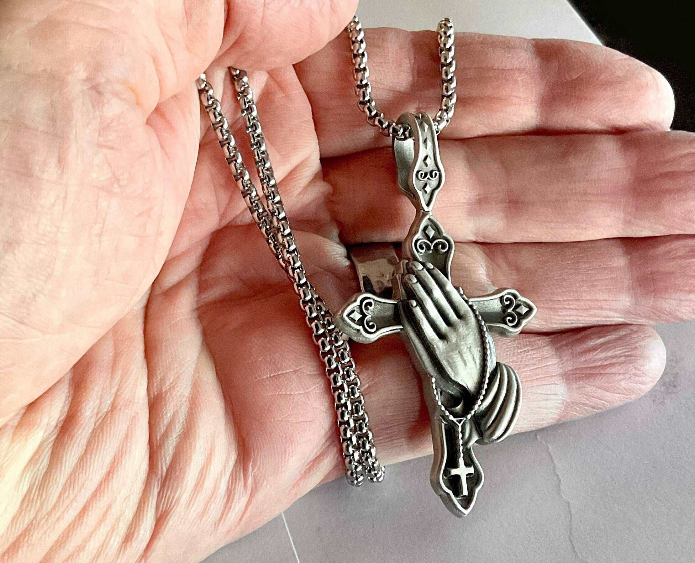 Silver chain rosary necklace with praying hands charm and crucifix