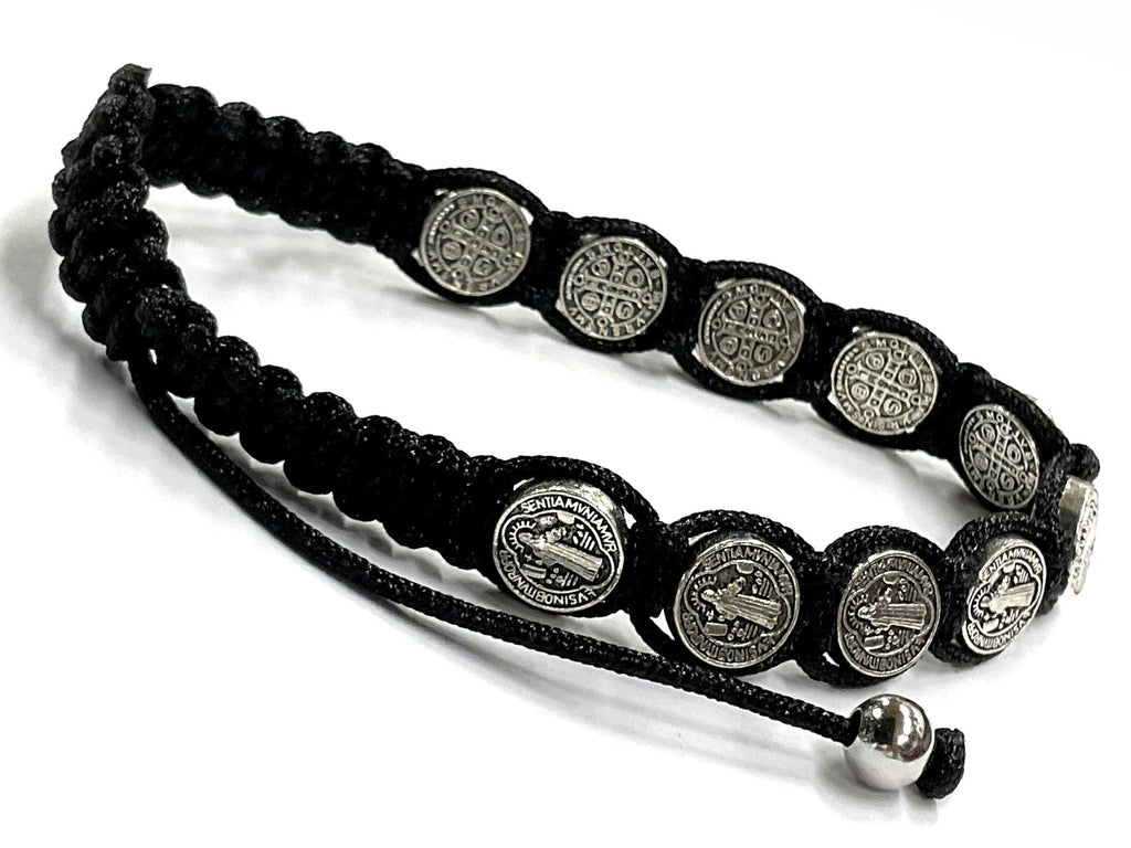 Black woven string bracelet with round silver-tone coin charms and adjustable pull loop
