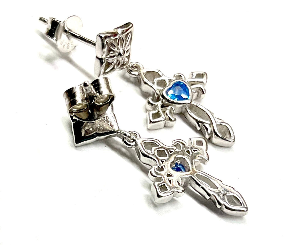 Sterling silver cross dangle earrings with blue zircon center stone and chain details
