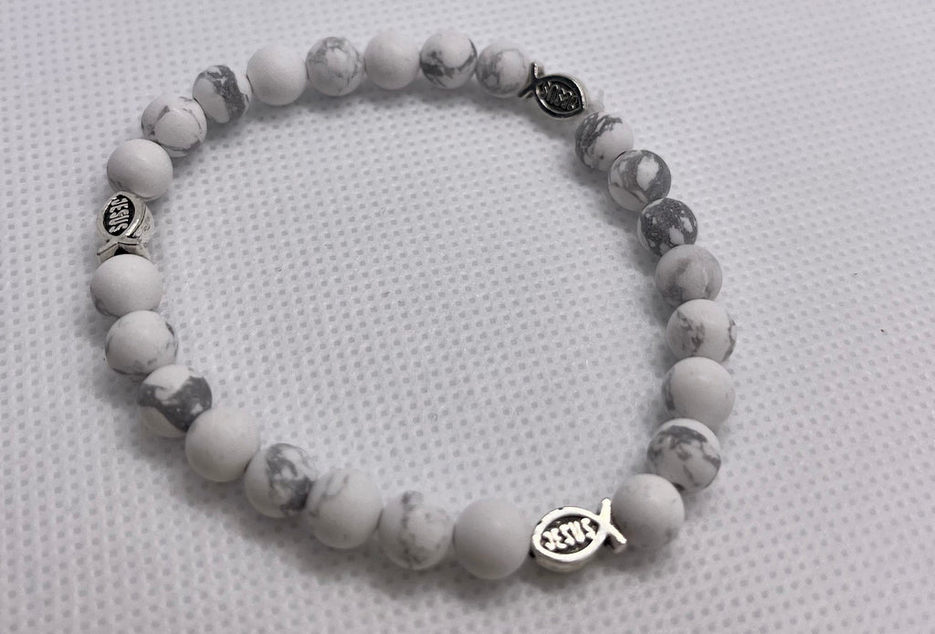 White marble beaded bracelet with fish charm and small metal accent beads