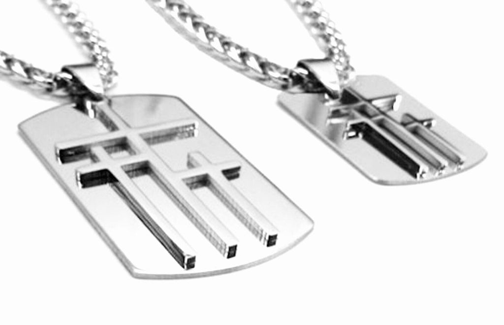 Pair of triple cross dog tag pendants on silver-tone chains