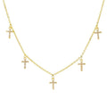 Gold-tone cross pendant necklace with five tiny cross charms
