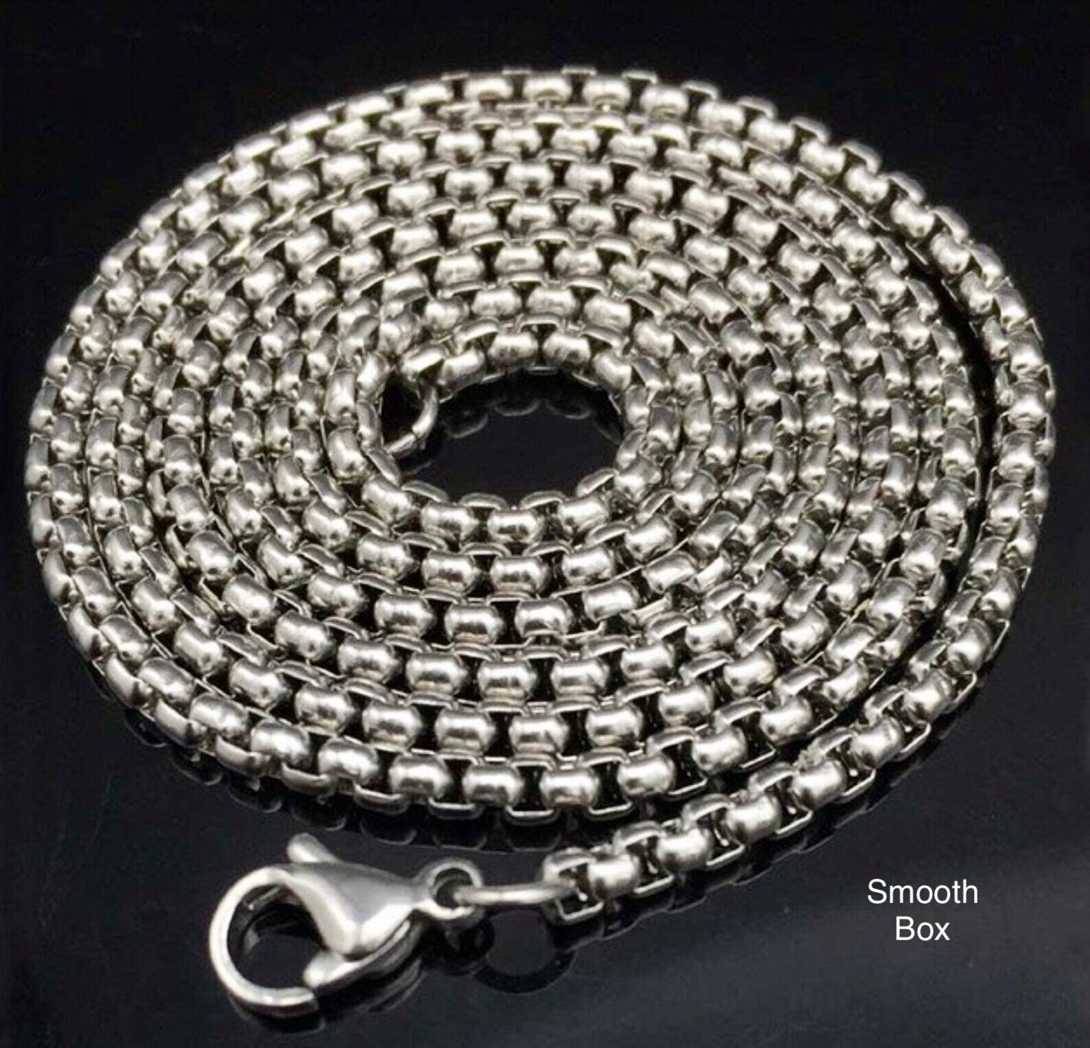 Silver link chain with oval clasp and box clasp closure