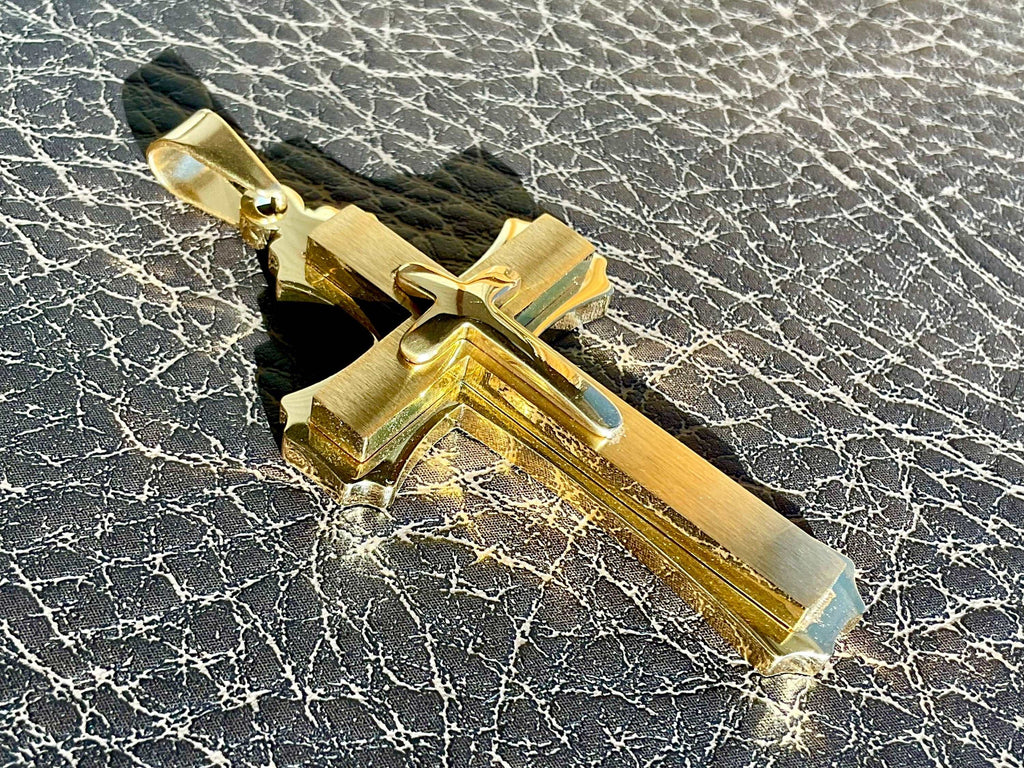 Gold-tone crucifix cross necklace with rectangular end caps and cross detail