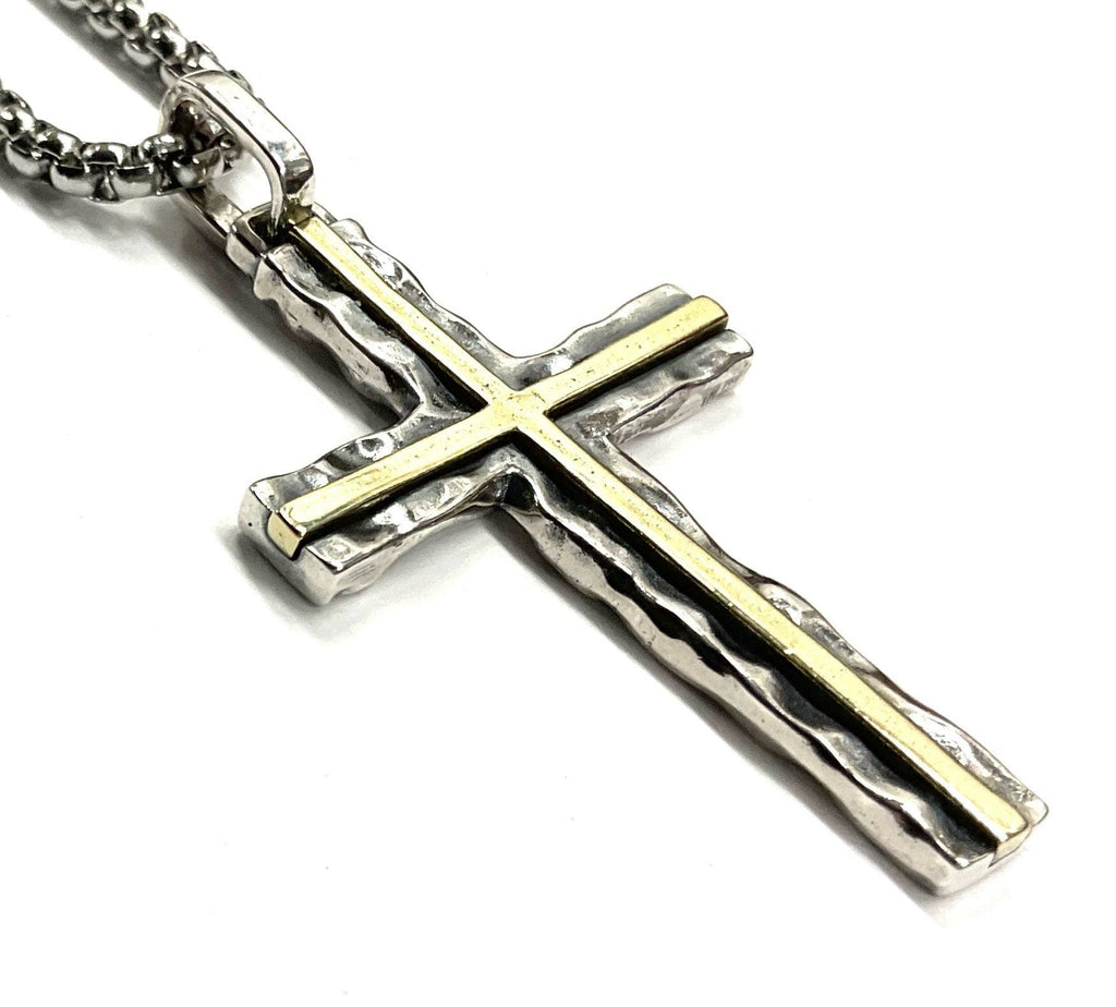 Silver cross pendant with long arms and brass inlay lines on a chain