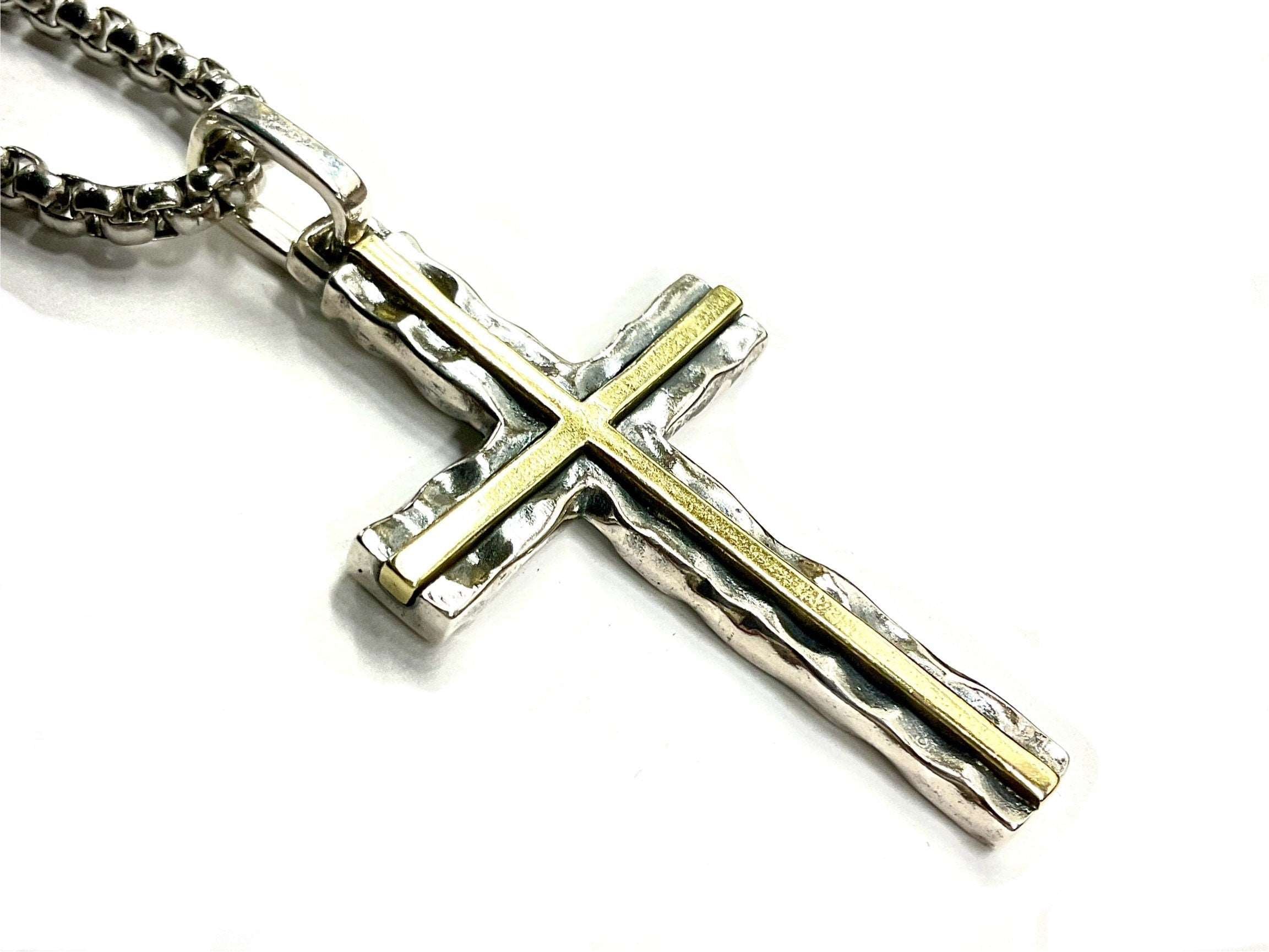 Silver cross pendant with brass inlay stripe accents on a chain