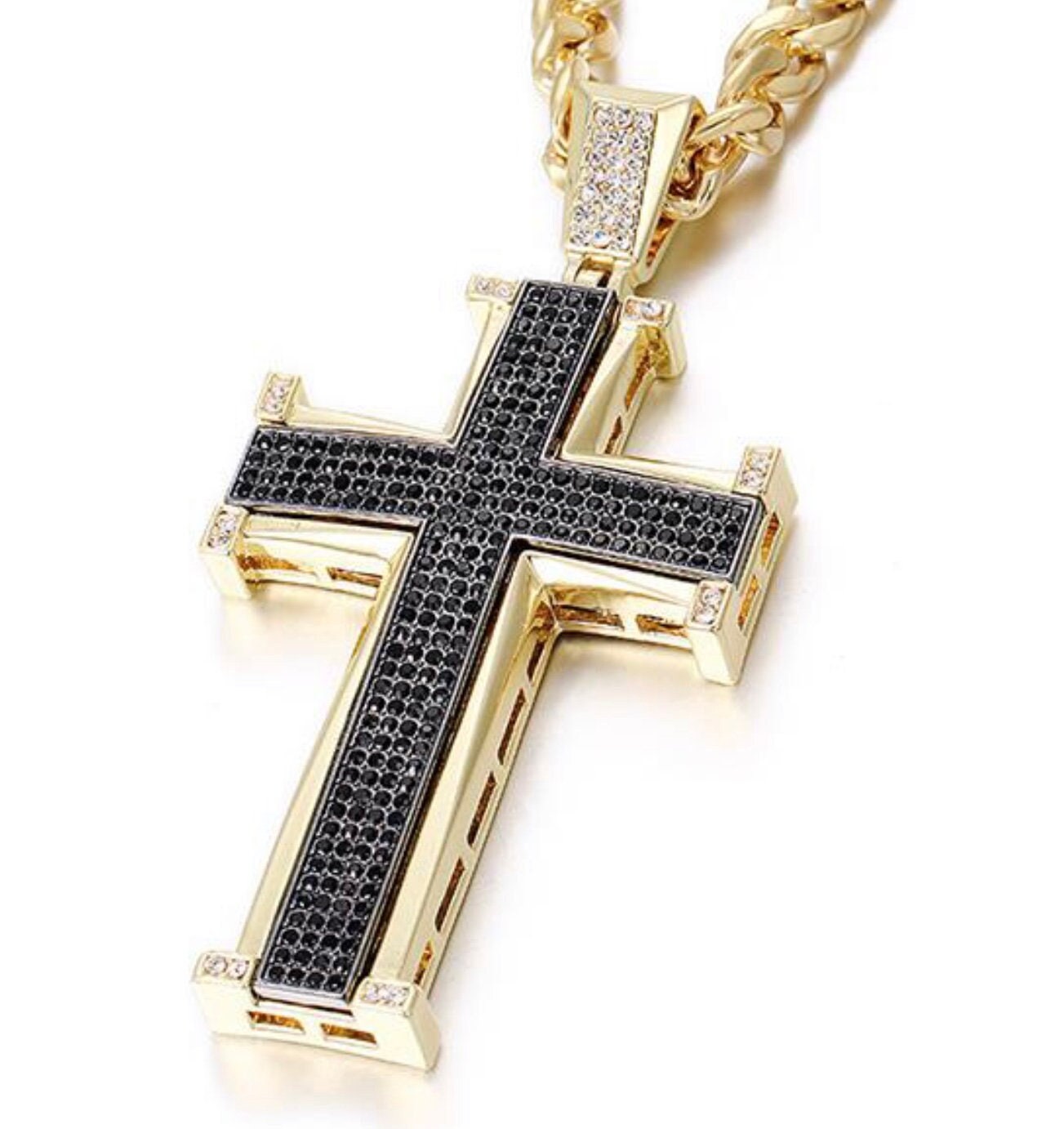 Crucifix cross necklace with gold-tone frame and black studded crystal inlay