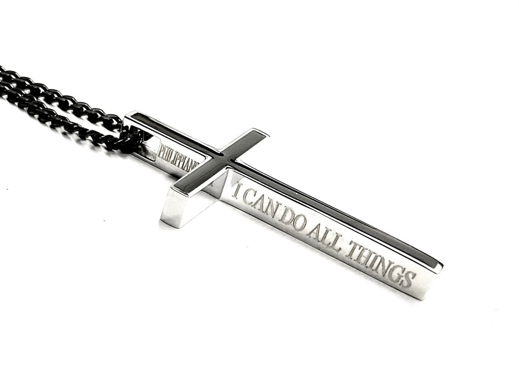 Silver cross necklace with black inlay, engraved “I CAN DO ALL THINGS” bar pendant