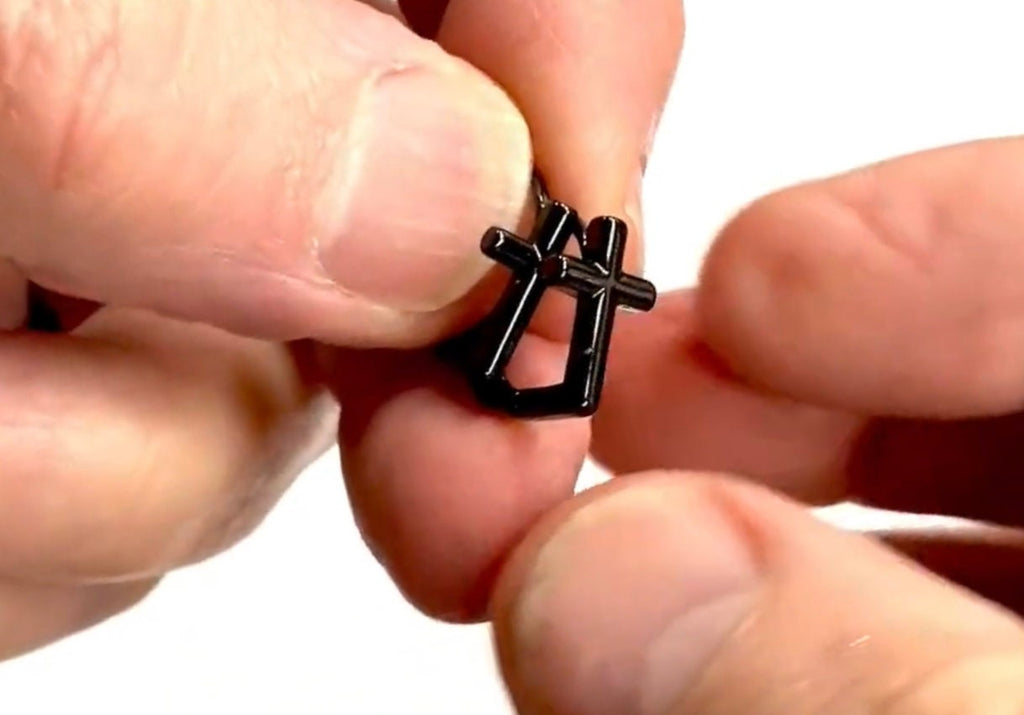 Small cross hoop cuff earring detail, hinged clasp and cross shape
