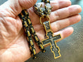 Stainless steel Orthodox cross pendant with wolf head details on gold-tone chain