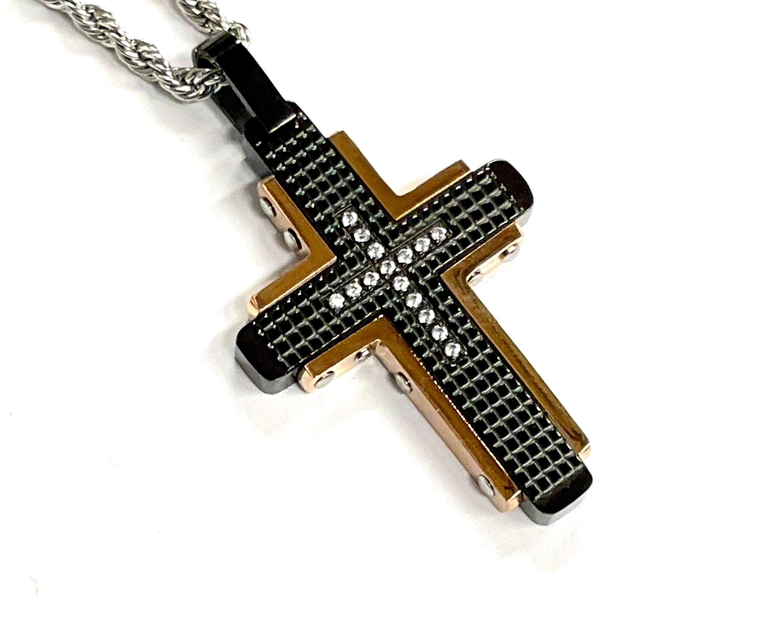 Black and gold cross pendant with rhinestone mesh detail and silver-tone chain