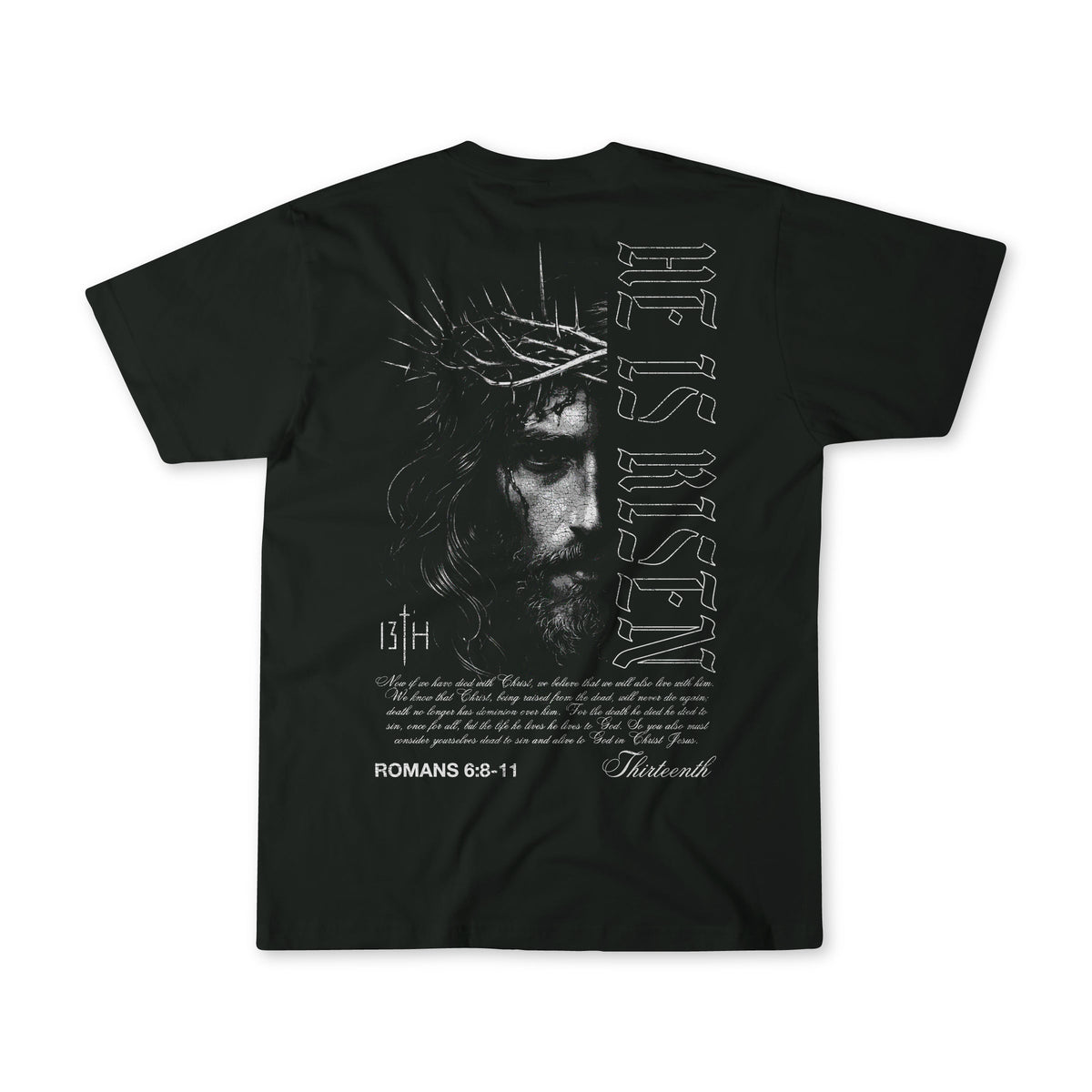 Black graphic t-shirt on white background with back portrait and scripture text