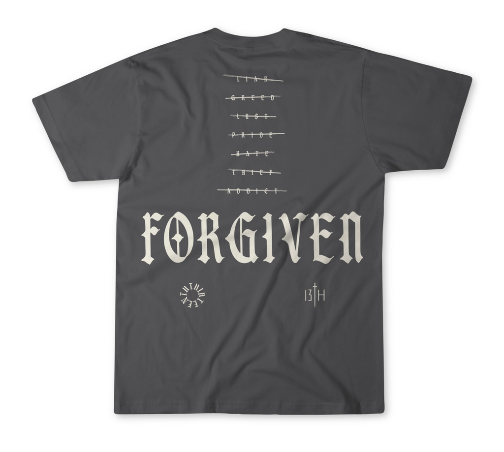 Black premium tee with centered FORGIVEN graphic and top alignment bar symbols, crew neck