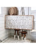 Wood quote sign with the text 'Freedom is never more than one generation away'