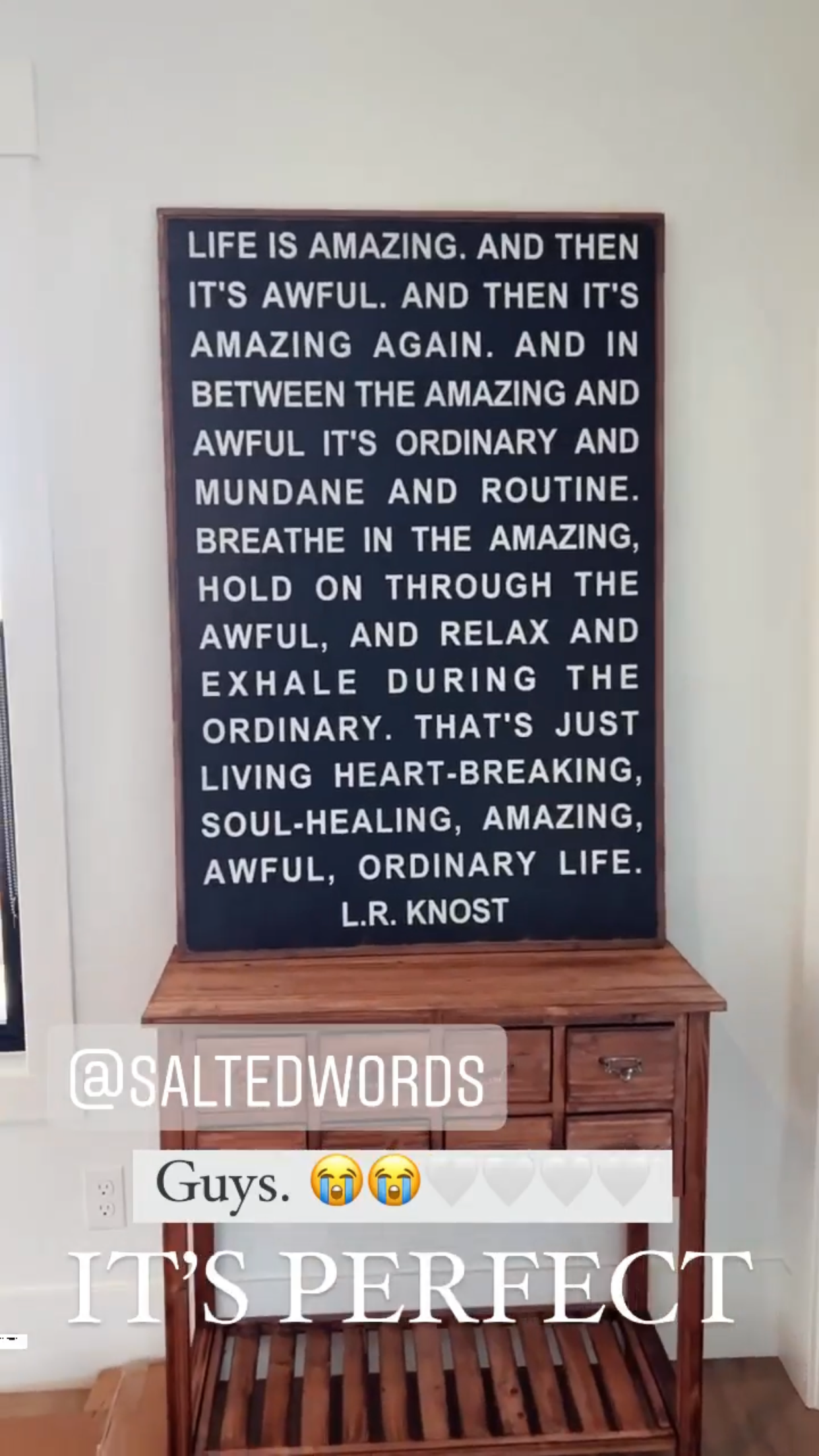 Wood-framed chalkboard wall sign with quote 'Life is amazing' and L.R. Knost