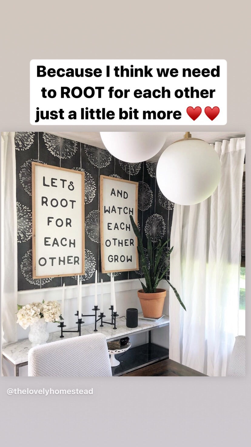 Framed wood wall signs with black lettering: LET’S ROOT FOR EACH OTHER and WATCH