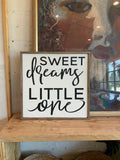 Sweet dreams little one wall sign with cursive script in white and black