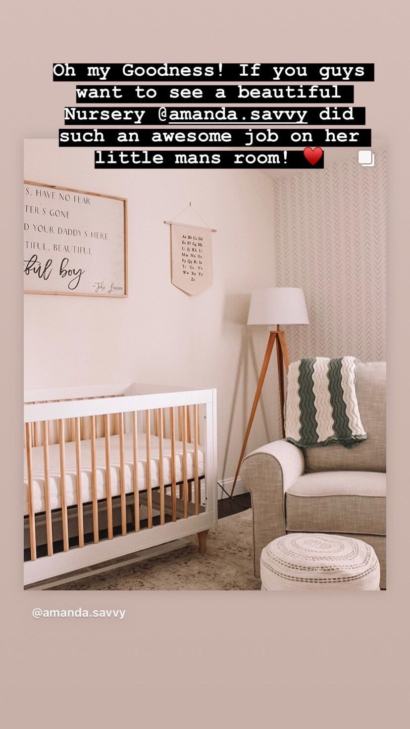 Nursery wall decor wood sign with handwritten-style quote above crib