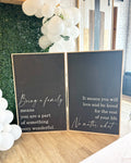 Framed wood wall sign set with chalk-style quotes, dark boards and light script