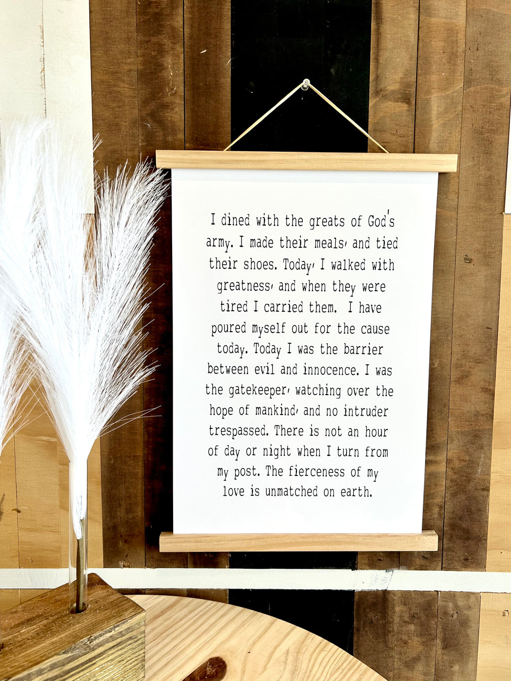 Framed wooden wall sign with quote text on white paper insert