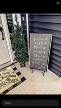 Framed wall hanging with handwritten-style “Silent night Holy night” text in dark and light tones
