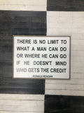 Framed wood quote sign reading 'There is no limit...' by Ronald Reagan