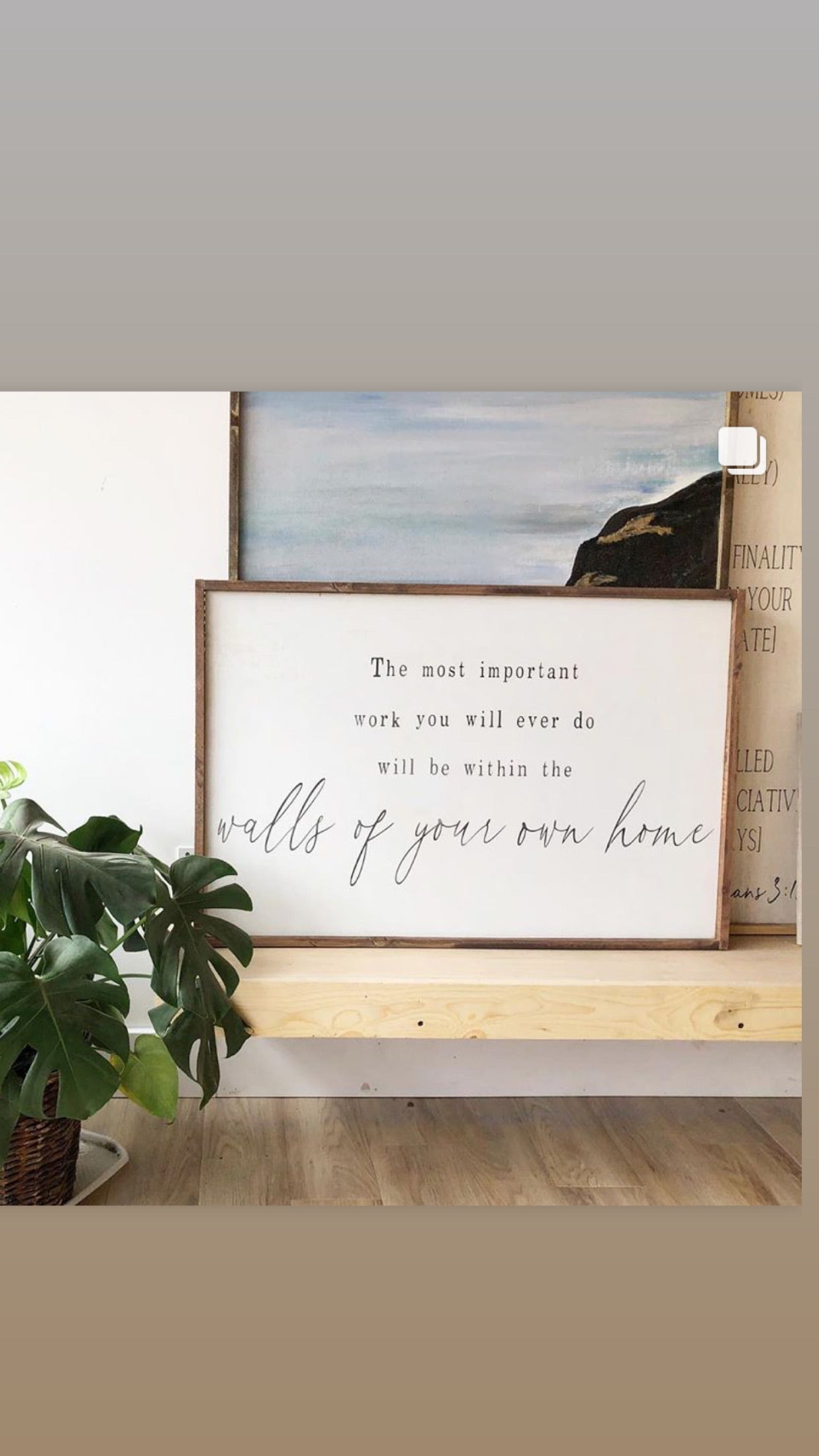 Framed quote sign, white background, black quote lettering