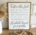 Framed wooden wall sign with “Trust in the Lord” scripture quote
