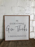 Framed wood wall art with black quote: “In Everything Give Thanks”, “1 Thessalonians 5:18”.