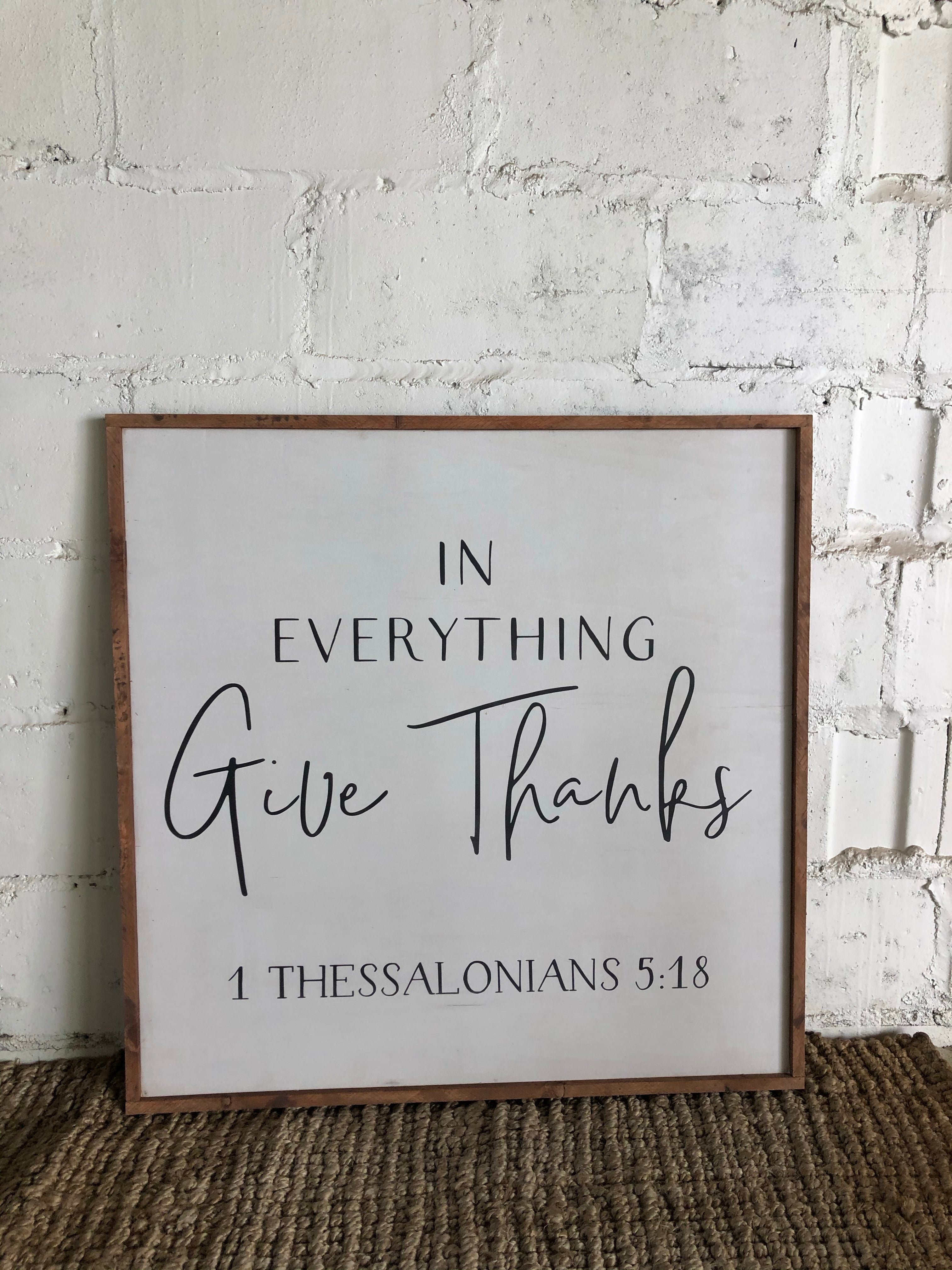 Framed wood wall art with black quote: “In Everything Give Thanks”, “1 Thessalonians 5:18”.