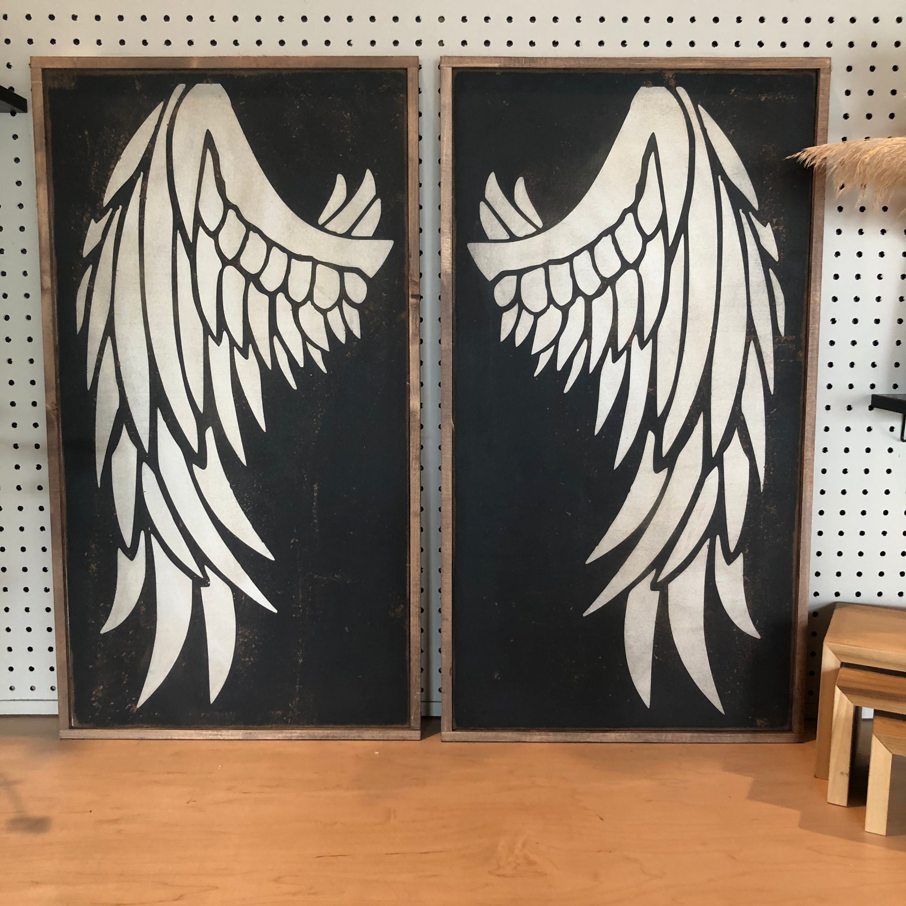 Set of 2 angel wing wood signs, black background with white detailed wing feathers