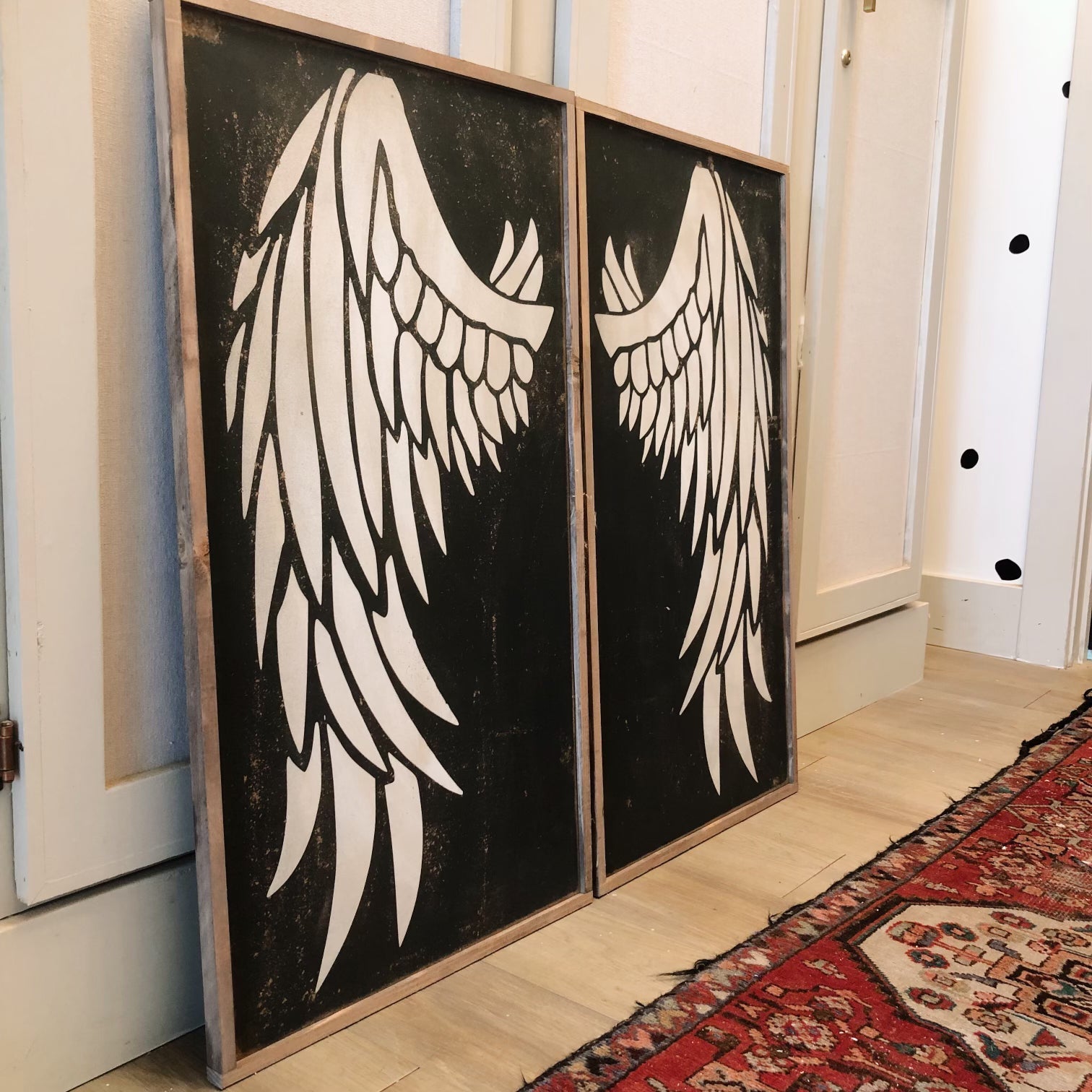 Set of 2 angel wing wall signs, black with white angel wings feather design
