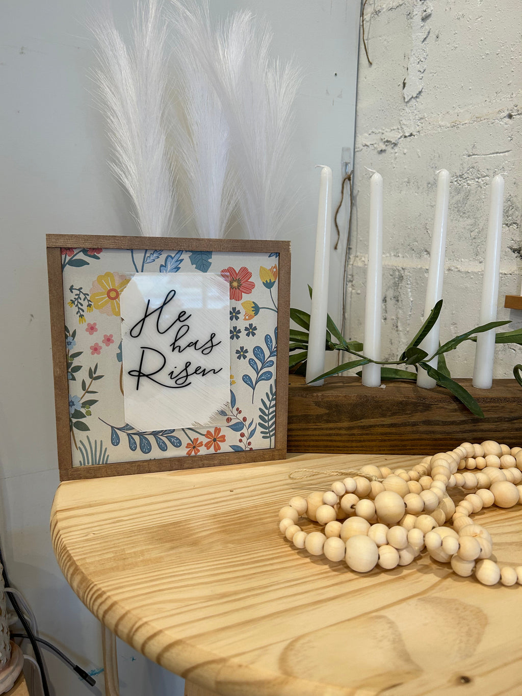 Modern farmhouse Christian wall sign with floral border and white center text