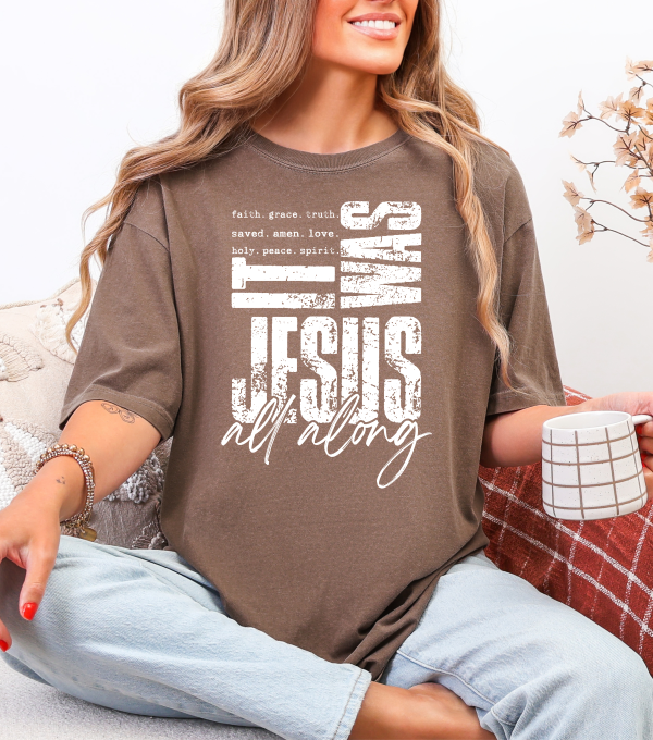 Heather brown graphic T-shirt with 'Jesus' block text and 'all along' script