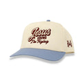Cream snapback hat with front script logo and side embroidered crossmark