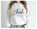 White crewneck sweatshirt with 'Jireh' front graphic and long sleeves