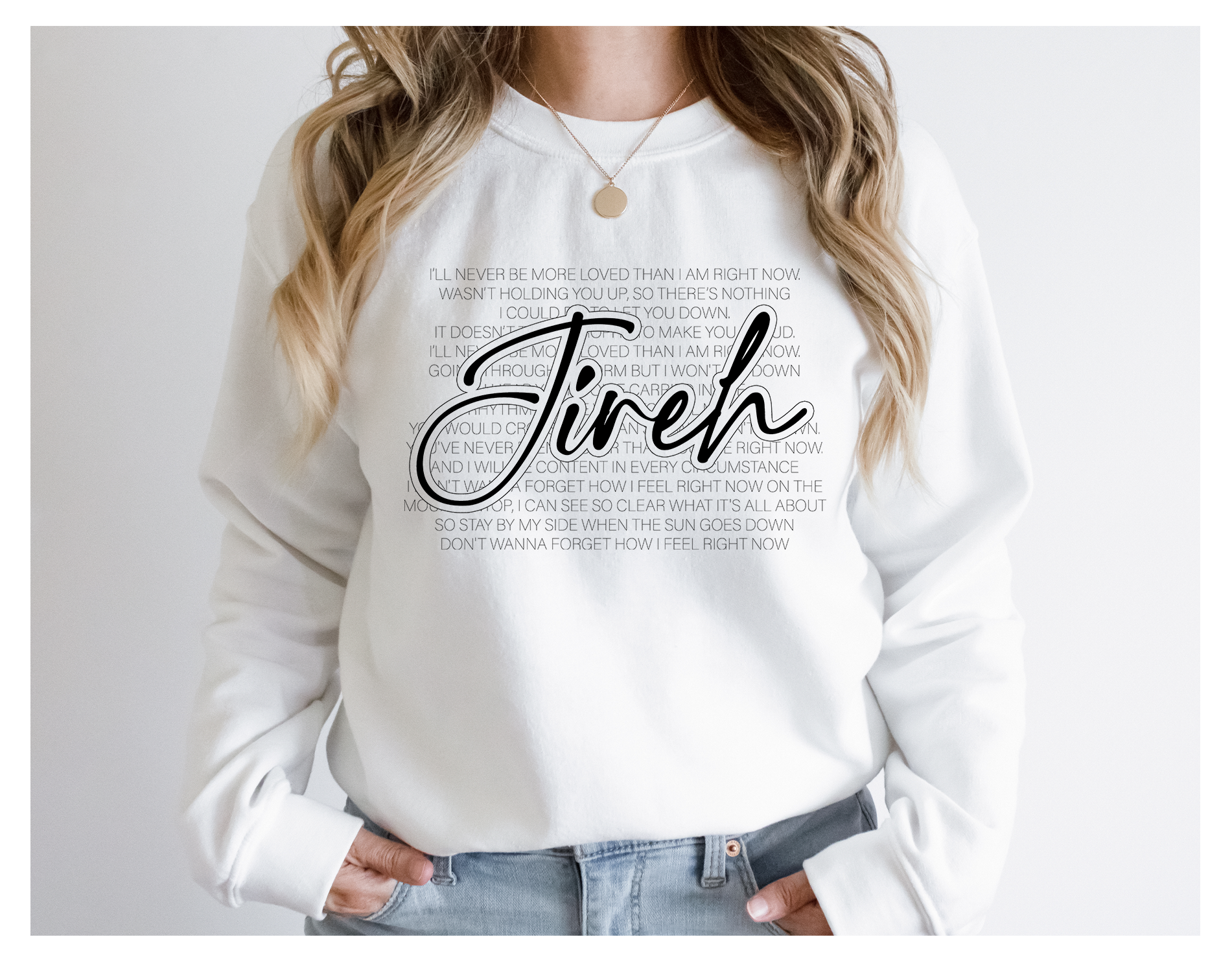 White crewneck sweatshirt with 'Jireh' front graphic and long sleeves