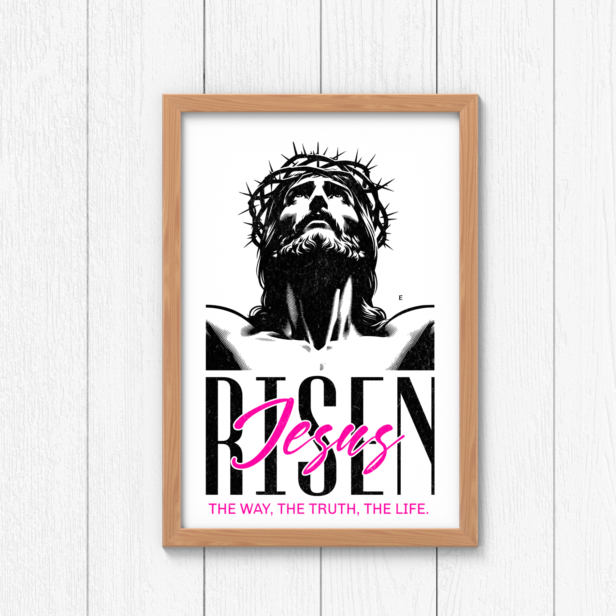 Framed wall art with black Jesus portrait and pink script 'Jesus' lettering