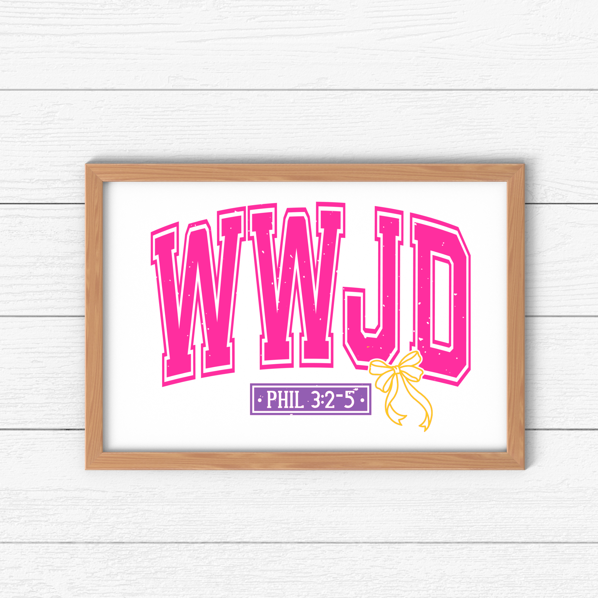 Framed WWJD wall art sign with pink text and 'Phil 3:2–5' plaque