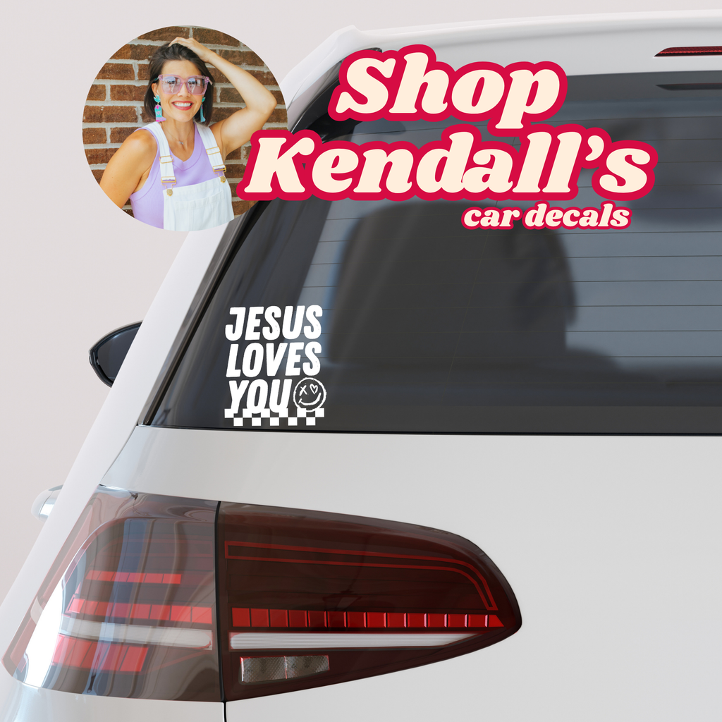 Jesus loves you car vinyl decal, black lettering with hearts and dots