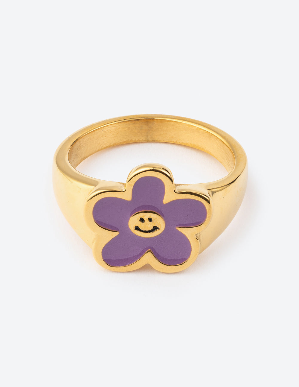 Gold-tone ring with lavender flower face, smiling center, enamel detail