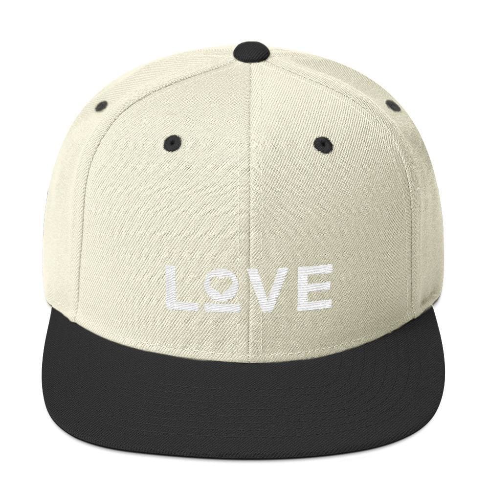 Love snapback hat with flat brim, cream hat with black brim and white LOVE logo
