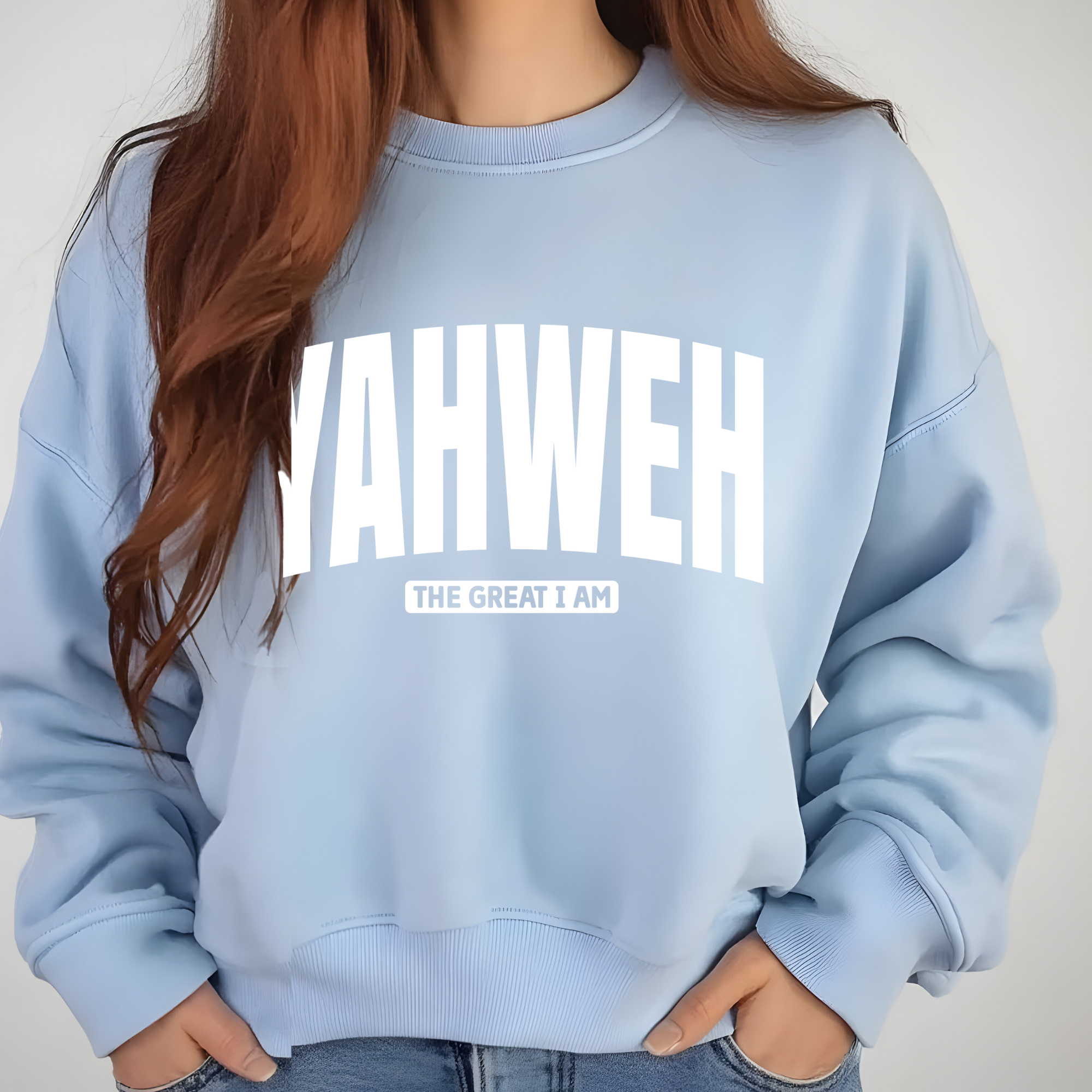 Light blue crewneck sweatshirt with YAHWEH logo and 'The Great I Am' text