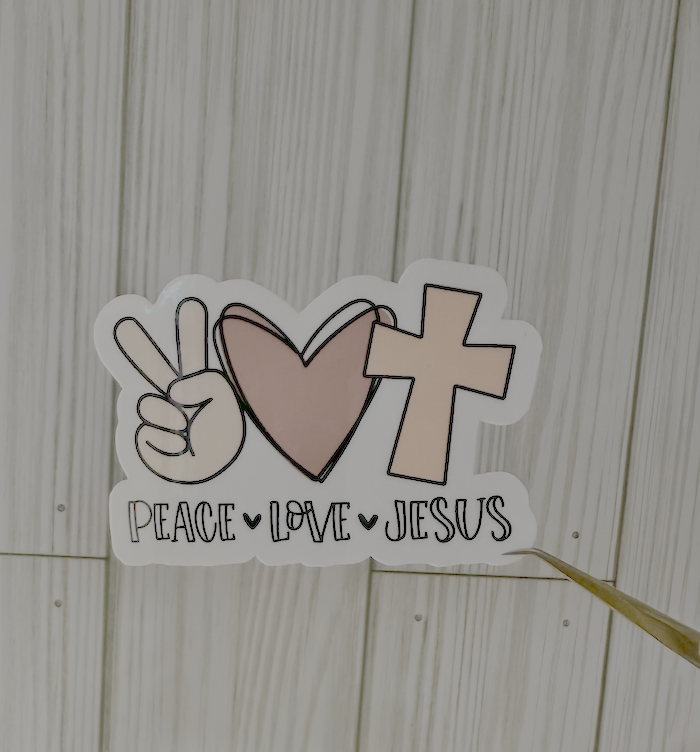 Peace-themed vinyl sticker with peace sign, heart, cross, and Peace Love Jesus text