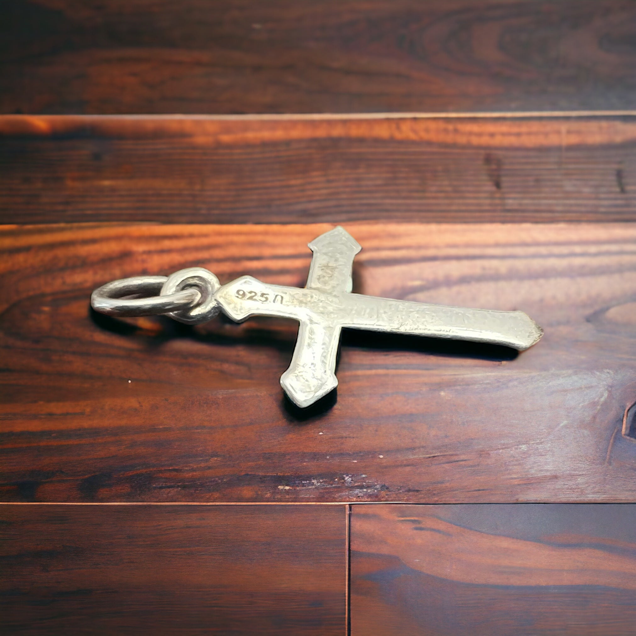 Sterling silver cross charm, stamped 925, with split ring and top loop