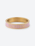 Pink enamel gold-tone ring with TRANSFORMED engraving, wide band
