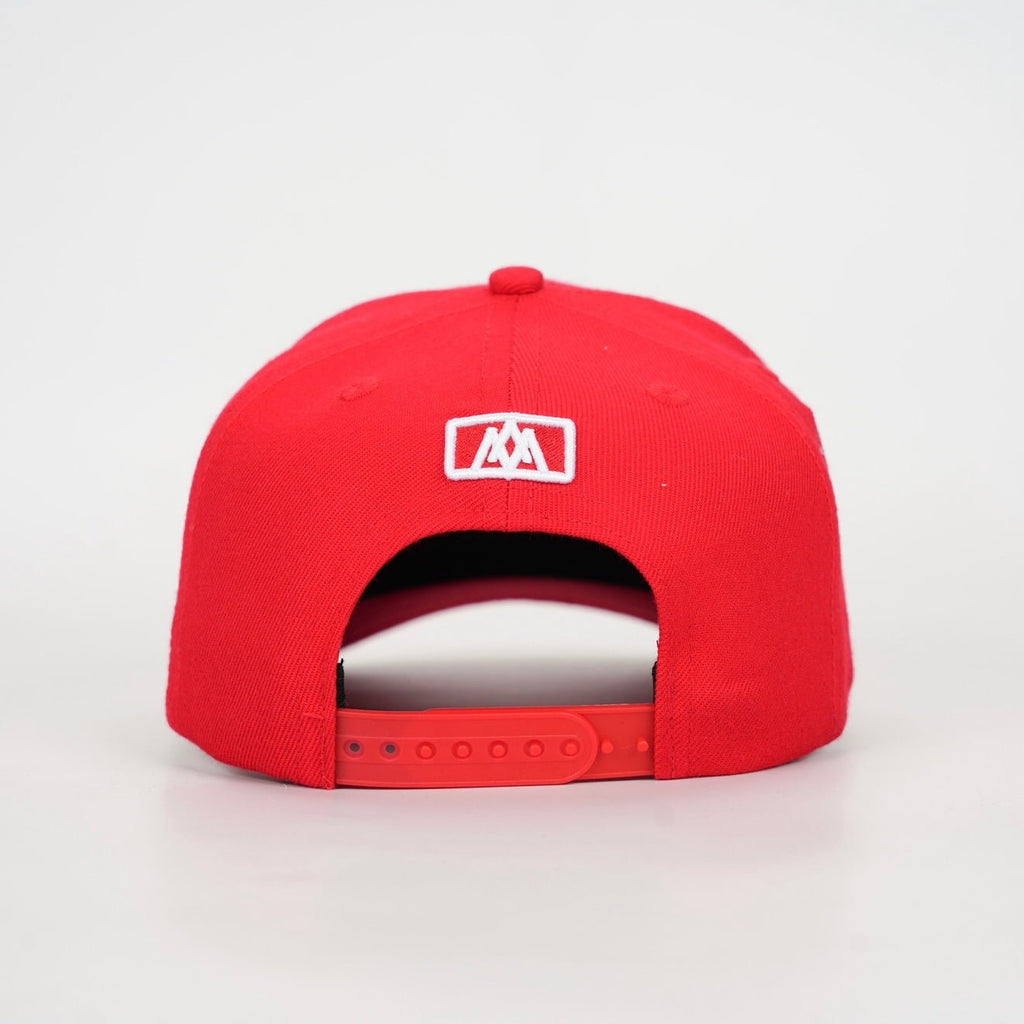 Red snapback cap with white square logo and adjustable back strap