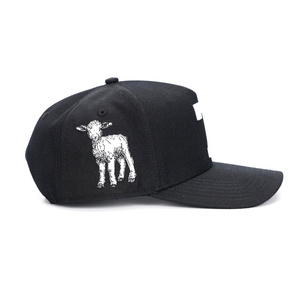 Black snapback cap with white goat graphic and small white "7" on side